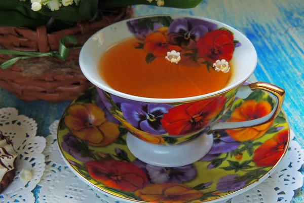 Tea and Lily of the valley — Stock Photo, Image