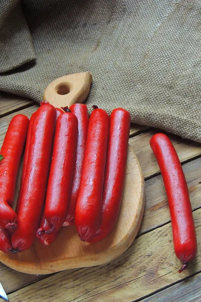 Sausage and knife — Stock Photo, Image
