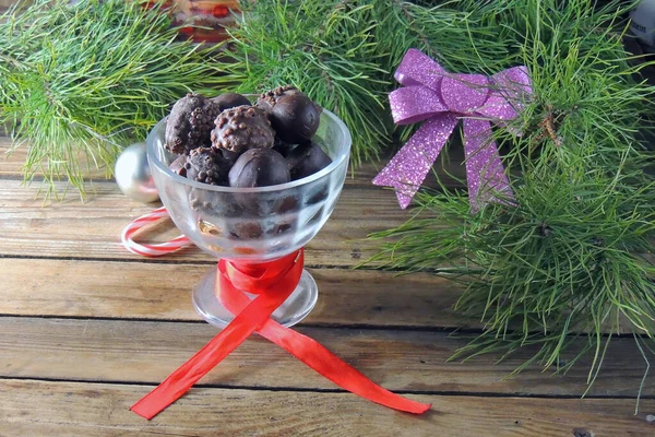 Čokoládové bonbóny. vánoční pozadí — Stock fotografie