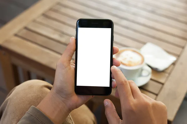 Close-up mão segurando telefone celular tela em branco e toque do dedo — Fotografia de Stock