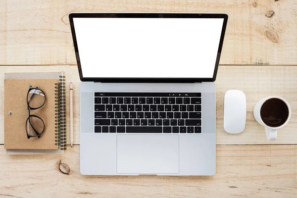 Laptop computer on work table top view — Stock Photo, Image