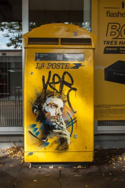 graffiti of the smoker on mailbox by the painter artist C215 clipart