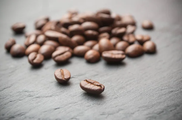 F coffee beans on chalkboard background — Stock Photo, Image