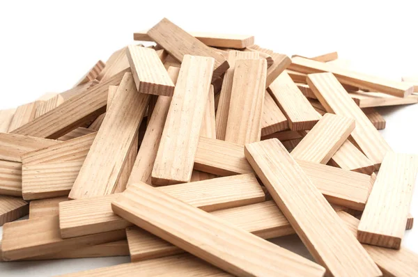 Stuk van houten baksteen van bouw spel op witte achtergrond — Stockfoto