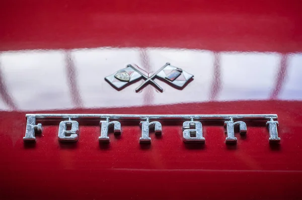 Closeup of red ferrari 250 GT logo — Stock Photo, Image