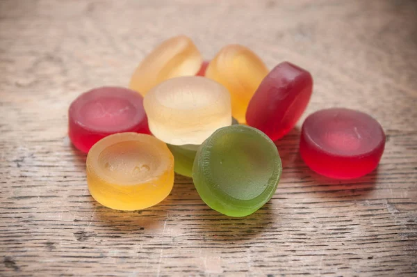 Jelly candies on wooden background — Stock Photo, Image