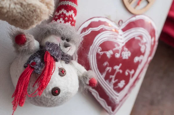 Decorative snowman and traditional alsatian heart in — Stock Photo, Image