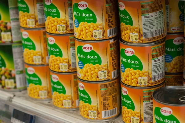 Closeup of corn in can at Cora supermarket — Stock Photo, Image