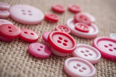 Kendir pembe dikiş düğmeleri arka plan doku 