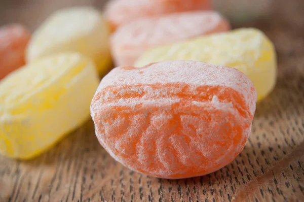 Traditional candies on wooden background — Stock Photo, Image