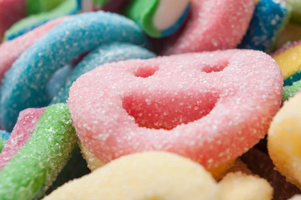 Acidulous  candies in shaped smiley texture — Stock Photo, Image