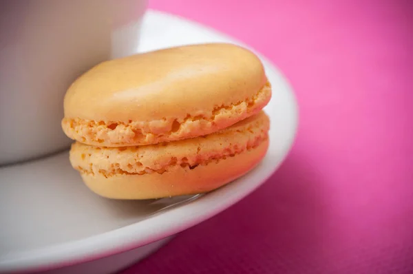 French macaron pastry on pink background — Stock Photo, Image