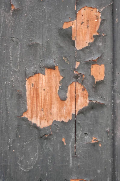 Pintura pelada en la antigua puerta de madera de la casa — Foto de Stock