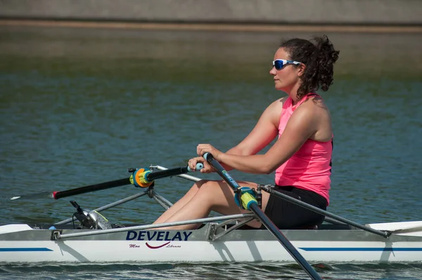 Woman  rowing in the channel — Stock Photo, Image