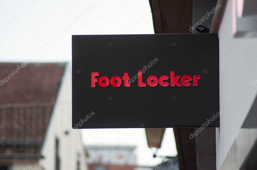 Mulhouse - France - 1 November 2019 - Closeup of foot locker sign on store front in the street