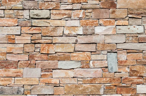 Detailní záběr dekorativní kamenované textury stěny — Stock fotografie