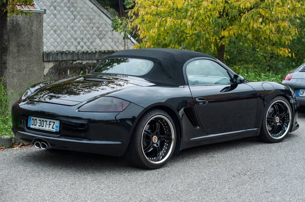 Rear view of black Porsche 718  parked in the street — Stock Photo, Image