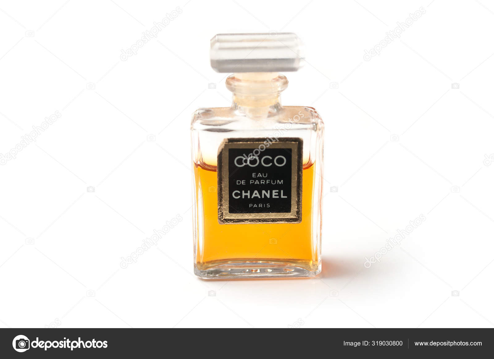 Coco Chanel Perfume in transparet bottle on white background
