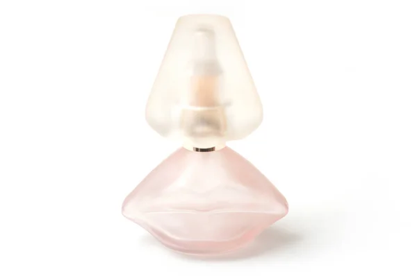 Salvator Dali parfum en flacon transparent rose en forme de bouche sur fond blanc — Photo
