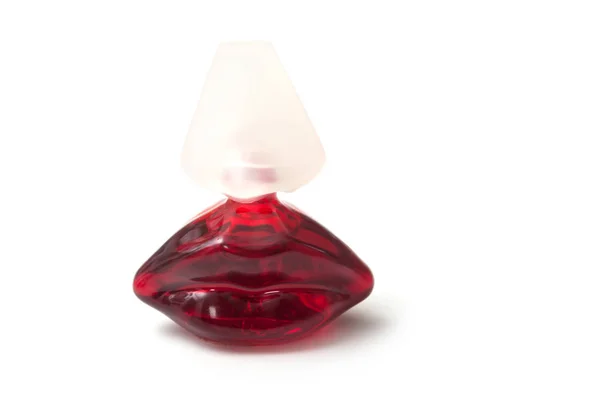 Salvator Dali perfume em garrafa vermelha em forma de boca sobre fundo branco — Fotografia de Stock