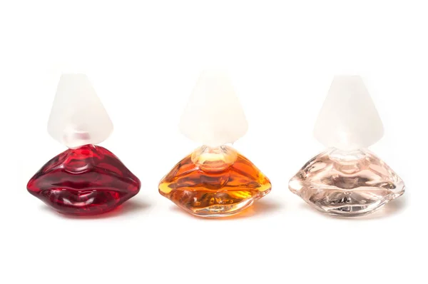 Kurtarıcı Dali parfümü şeffaf şişelerde beyaz arka planda ağzı şekillendirilmiş. — Stok fotoğraf