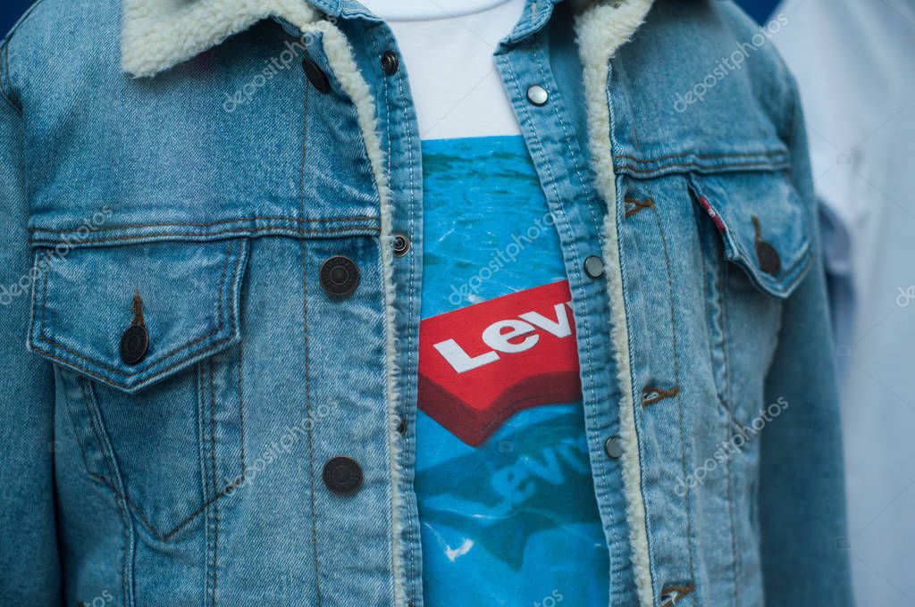 Mulhouse - France - 1 December 2019 - Closeup of blue jeans jacket by levis in the famous chain of fashion store