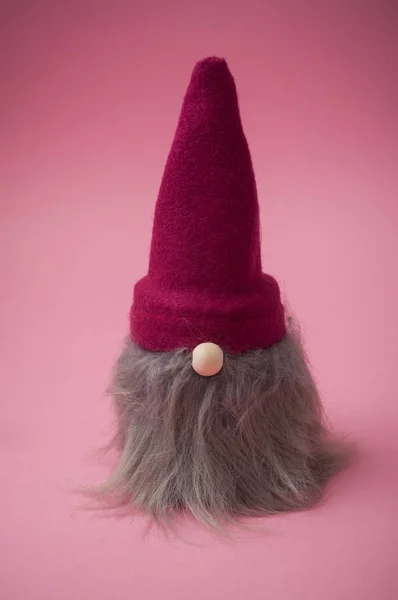 Closeup of christmas gnome on pink background — Stock Photo, Image