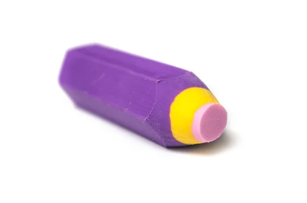 Closeup of colorful eraser in shaped pencil on white background — Stock fotografie