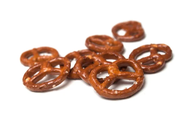 Closeup of salted pretzels on white background — Stock Photo, Image