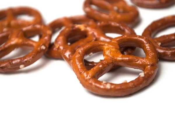 Closeup of salted pretzels on white background — Stock Photo, Image