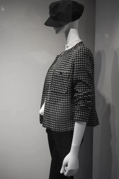 Closeup of luxury clothes on mannequin in a fashion store