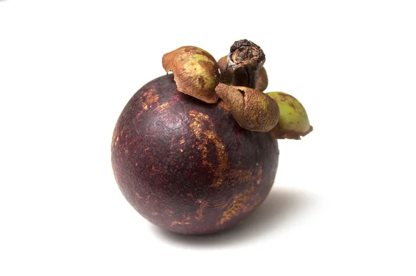 Closeup of purple mangosteen on white background — 스톡 사진