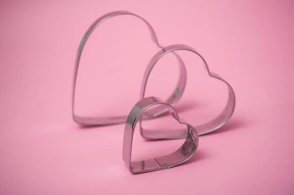 Closeup of metallic piece for pastry in shaped heart — ストック写真