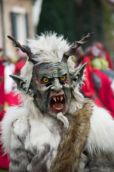 People with scary costume parading in the street — ストック写真