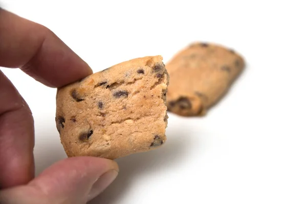 Närbild Crunched Cookies Handen Vit Bakgrund — Stockfoto