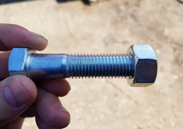 The silver bolt to tighten the flanges of pipelines
