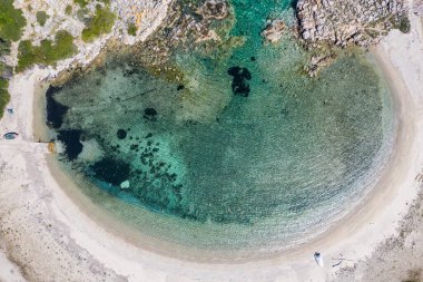 Aerial drone view of Paliouri Beach in Kassandra Sithonia penisula  Chalkidiki Greece clipart