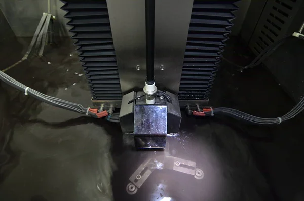 Electrical discharge machining in work