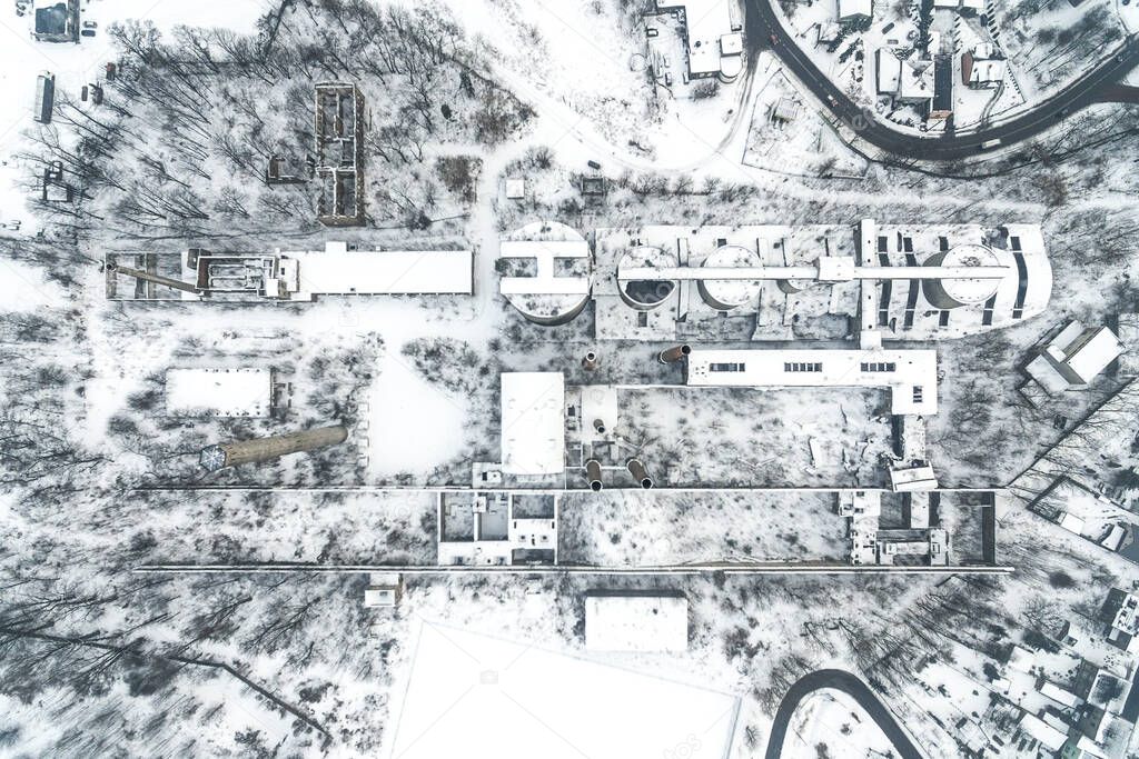 Old abandoned cement factory winter snow time in Bedzin Poland aerial drone photo