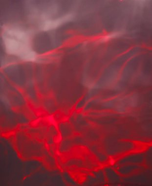 Soyut arkaplan. Su sıçraması. Rubin kırmızısı