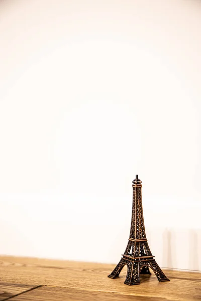 Paris statuette on a white background