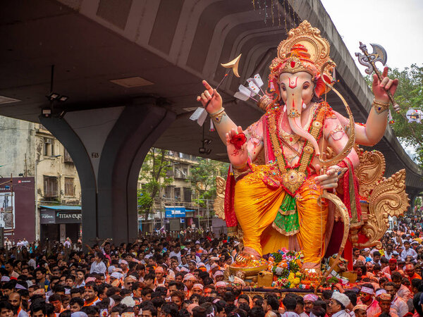 Mumbai, India - September 12,2019 : Thousands of devotees bid adieu to tallest Lord Ganesha in Mumbai during Ganesh Visarjan which marks the end of the ten-day-long Ganesh Chaturthi festival.