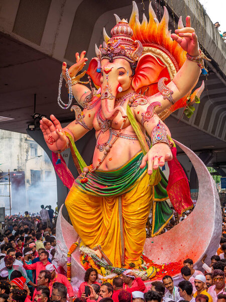 Mumbai, India - September 12,2019 : Thousands of devotees bid adieu to Lord Ganesha in Mumbai during Ganesh Visarjan which marks the end of the ten-day-long Ganesh Chaturthi festival.
