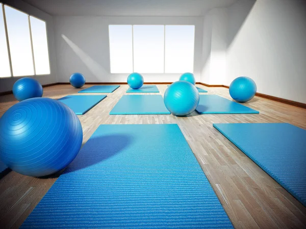Alfombra de pilates y bolas de ejercicio de pie en el suelo de parquet. Ilustración 3D —  Fotos de Stock