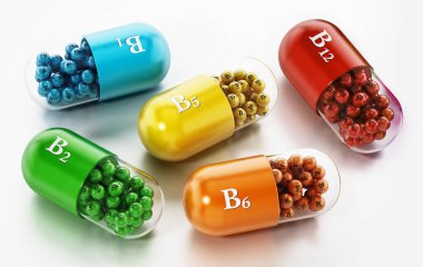 Beyaz arka planda izole edilmiş çeşitli B vitamini hapları. 3d illüstrasyon