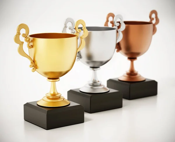 Золоті, срібні та бронзові чашки ізольовані на білому тлі. 3D ілюстрація — стокове фото