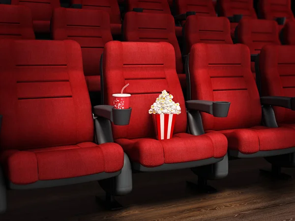 Sedia cinematografica rossa illuminata con popcorn e soda. Illustrazione 3D — Foto Stock