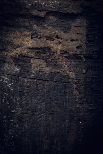 Zwarte donkere houten achtergrond, houten plank ruw graan oppervlak — Stockfoto