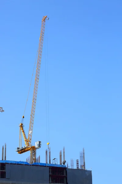 Machinery crane working in construction site building industry — Stock Photo, Image