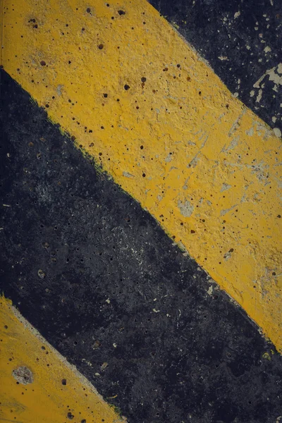 Black and yellow traffic sign warning background — Stock Photo, Image